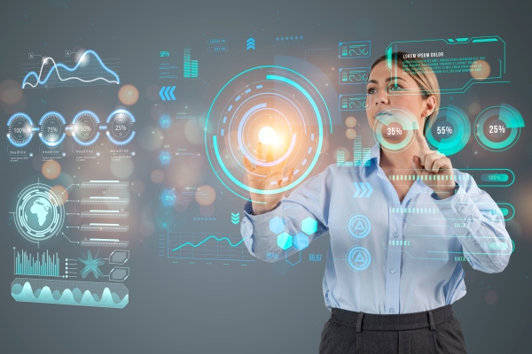 Tendencias tecnológicas 2024 - Mujer de negocios trabaja en una plataforma virtual que le permite acceder a la métricas y análisis detallados del rendimiento de su empresa 