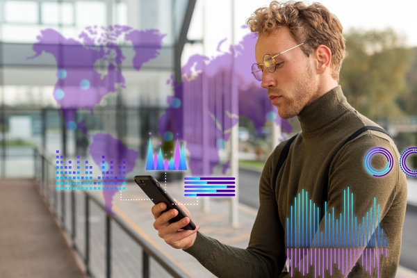 Tendencias tecnológicas 2024 - Hombre con gafas se conecta a su red de datos 5G para estar al día con las noticias e innovaciones tecnológicas a nivel mundial 